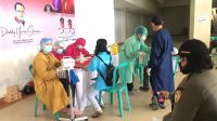 Vaksinasi Covid19 distadion utama Malinau ( Foto Rahmawati )